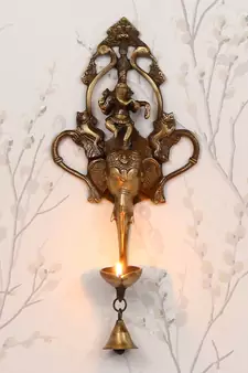 eCraftIndia DECORative Handcrafted Brass Wall Hanging of Dancing Ganesha on Elephant Head with Diya and Bell
