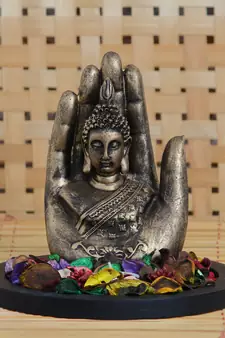 eCraftIndia Copper Finish Handcrafted Palm Buddha DECORative Showpiece with Wooden Base  Fragranced Petals and Tealight