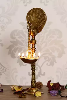 eCraftIndia DECORative Handcrafted Brass Peocock Showpiece Diya for 5 wicks with Stand
