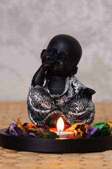 eCraftIndia DECORative Smiling Monk Silver Buddha with Wooden Base  Fragranced Petals and Tealight