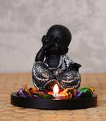 eCraftIndia DECORative Smiling Monk Silver Buddha with Wooden Base  Fragranced Petals and Tealight