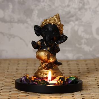 Golden and Black Lord Ganesha Dancing Avatar DECORative Showpiece with Wooden Base  Fragranced Petals and Tealight 1