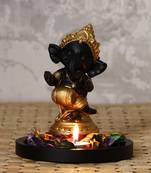 Golden and Black Lord Ganesha Dancing Avatar DECORative Showpiece with Wooden Base  Fragranced Petals and Tealight