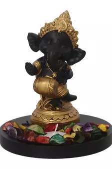 Golden and Black Lord Ganesha Dancing Avatar DECORative Showpiece with Wooden Base  Fragranced Petals and Tealight