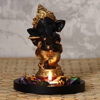 Golden and Black Lord Ganesha Dancing Avatar DECORative Showpiece with Wooden Base  Fragranced Petals and Tealight 1