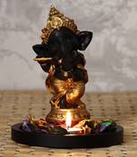 Golden and Black Lord Ganesha Dancing Avatar DECORative Showpiece with Wooden Base  Fragranced Petals and Tealight