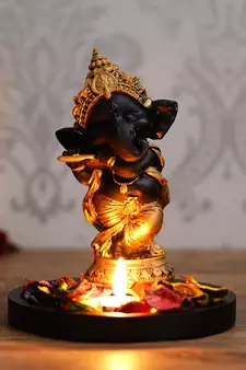 Golden and Black Lord Ganesha Dancing Avatar DECORative Showpiece with Wooden Base  Fragranced Petals and Tealight