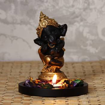 Golden and Black Lord Ganesha Dancing Avatar DECORative Showpiece with Wooden Base  Fragranced Petals and Tealight 1