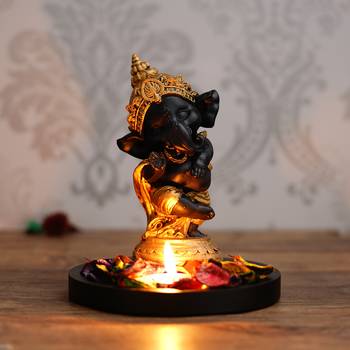 Golden and Black Lord Ganesha Dancing Avatar DECORative Showpiece with Wooden Base  Fragranced Petals and Tealight 2