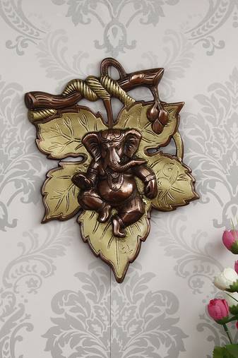 eCraftIndia Golden Finish Lord Ganesha on Creative Leaf Handcrafted Metal Wall Hanging