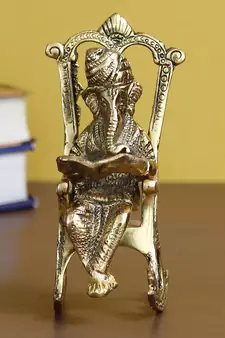 eCraftIndia Golden Lord Ganesha on Rocking Chair Antique Showpiece