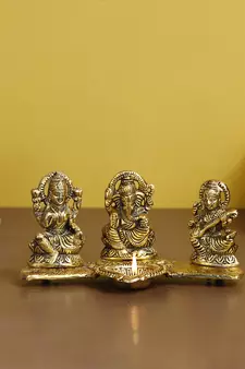 Gold-Plated Lakshmi, Saraswati, and Ganesha Statues