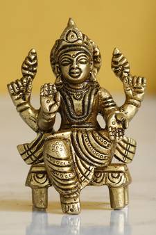eCraftIndia Goddess Laxmi on Chowki Handcrafted Brass Figurine