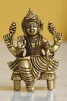 eCraftIndia Goddess Laxmi on Chowki Handcrafted Brass Figurine