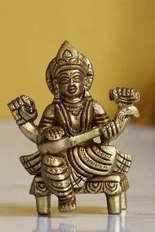 eCraftIndia Goddess Saraswati on Chowki Handcrafted Brass Figurine