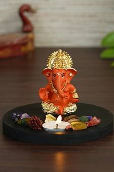 Gold Plated Orange Siddhivinayaka Ganesha DECORative Showpiece with Wooden Base  Fragranced Petals and Tealight