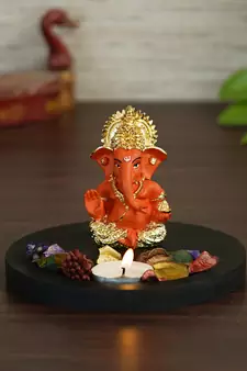 Gold Plated Orange Siddhivinayaka Ganesha DECORative Showpiece with Wooden Base  Fragranced Petals and Tealight