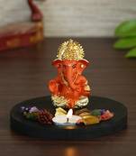 Gold Plated Orange Siddhivinayaka Ganesha DECORative Showpiece with Wooden Base  Fragranced Petals and Tealight