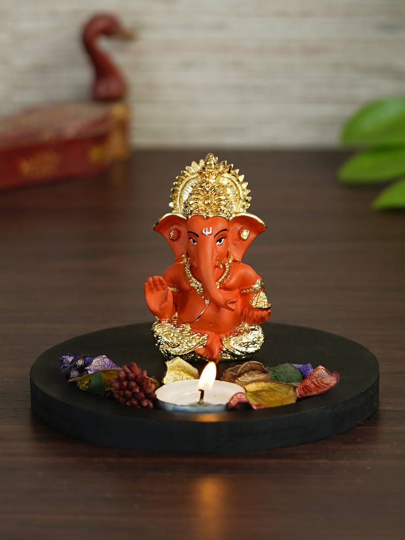 Gold Plated Orange Siddhivinayaka Ganesha DECORative Showpiece with Wooden Base  Fragranced Petals and Tealight