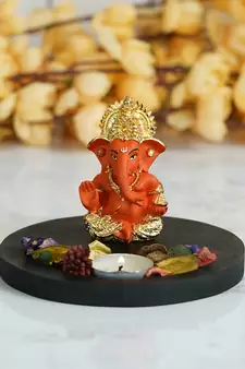 Gold Plated Orange Siddhivinayaka Ganesha DECORative Showpiece with Wooden Base  Fragranced Petals and Tealight