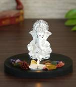 Silver Plated White Siddhivinayaka Ganesha DECORative Showpiece with Wooden Base  Fragranced Petals and Tealight