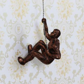 eCraftIndia Man Trying to Climb DECORative Wall Hanging Figurine 1