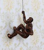 eCraftIndia Man Trying to Climb DECORative Wall Hanging Figurine