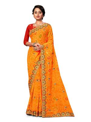 Yellow embroidered georgette saree with blouse 1