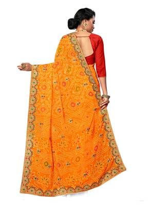 Yellow embroidered georgette saree with blouse 3