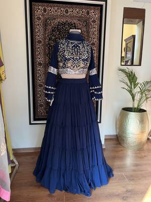 Blue embroidered crop top and layered lehenga 1