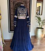 Blue embroidered crop top and layered lehenga