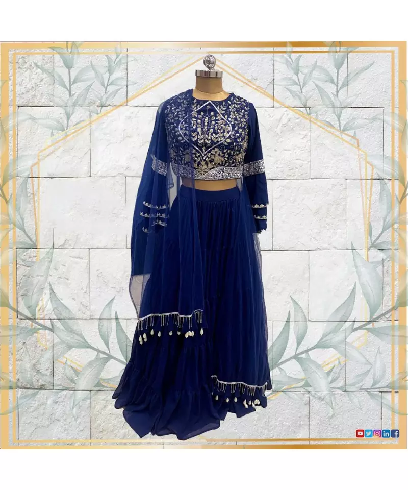 Blue embroidered crop top and layered lehenga