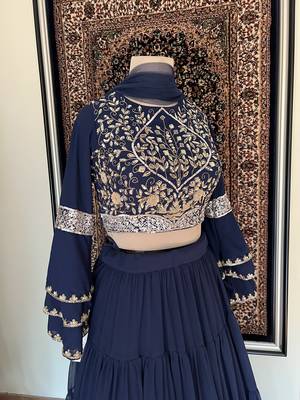Blue embroidered crop top and layered lehenga 2
