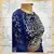 Blue embroidered crop top and layered lehenga