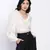 oatallic white frilled design women crop top