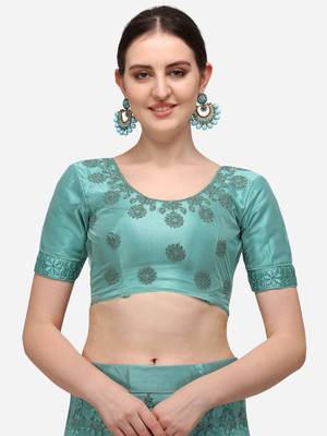 Turquoise embroidered net semi stitched lehenga 4