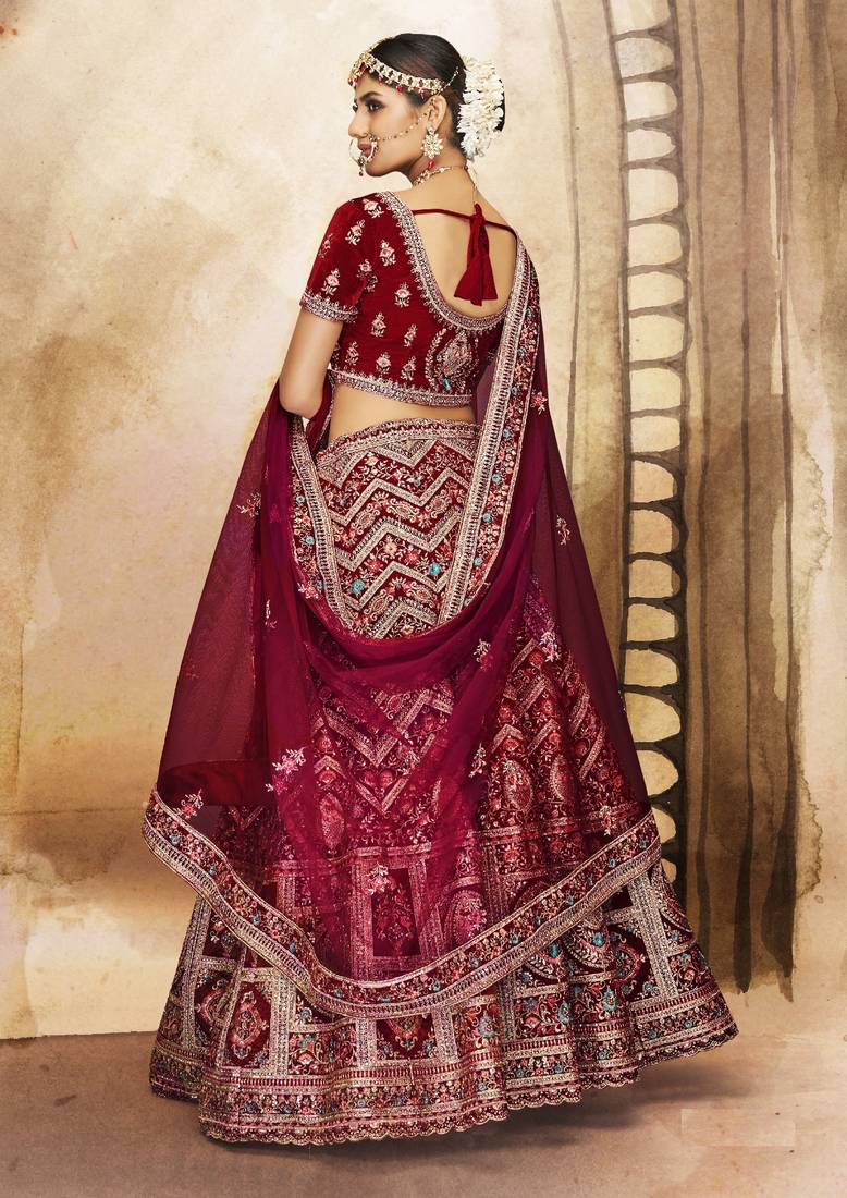Maroon Thread, dori, zari, and sequins embroidered velvet lehenga choli for dulhan
