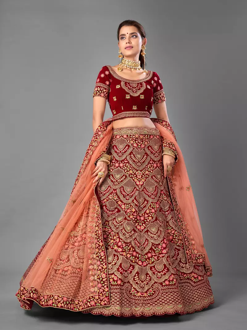Maroon embroidered velvet semi stitched lehenga