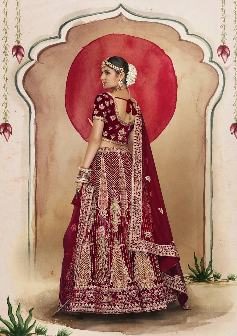 Maroon Thread, dori, zari, and sequins embroidered velvet lehenga choli for nuptial