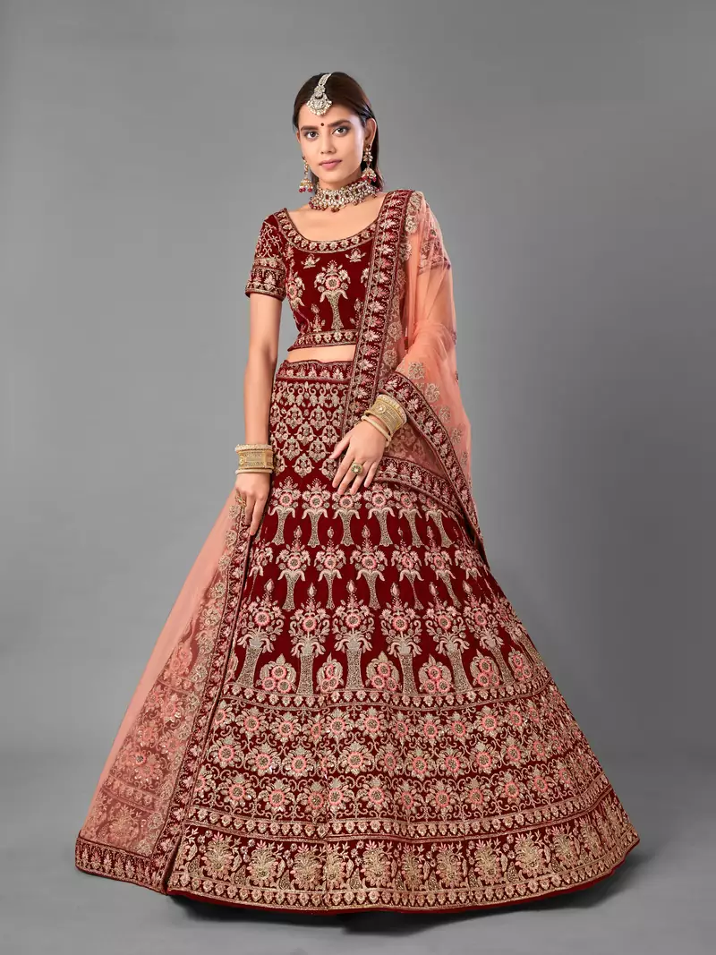 Maroon embroidered velvet semi stitched lehenga