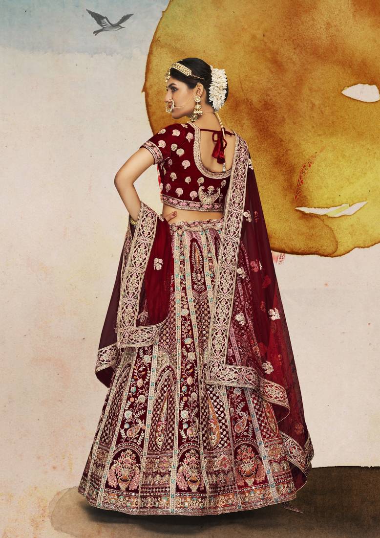 Maroon Thread, dori, zari, and sequins embroidered velvet bridal lehenga choli