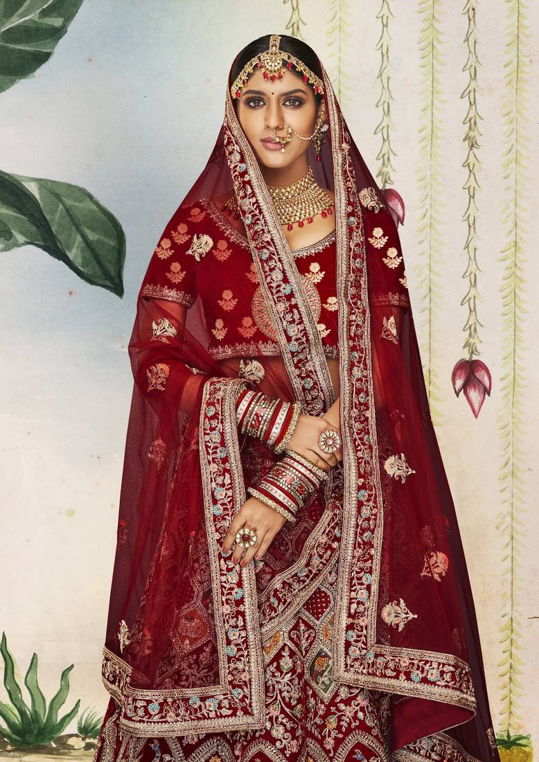 Maroon Thread, dori, zari, and sequins embroidered velvet wedding lehenga choli