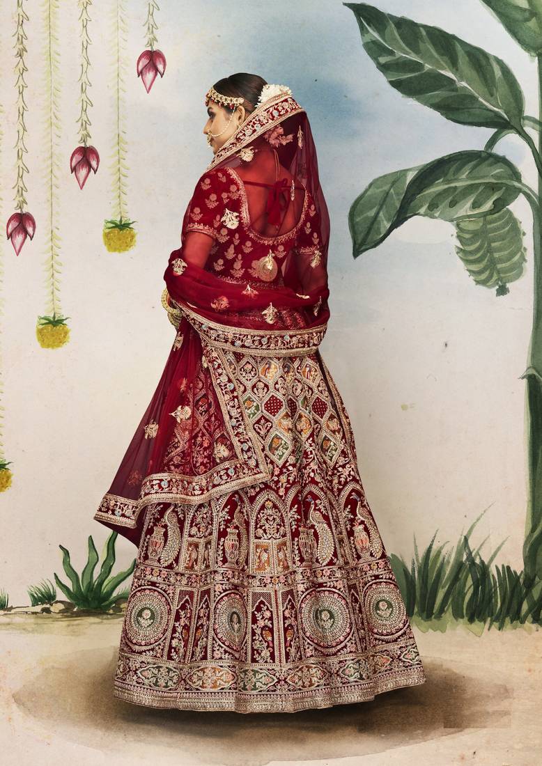 Maroon Thread, dori, zari, and sequins embroidered velvet wedding lehenga choli