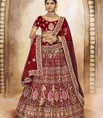 Maroon Thread, dori, zari, and sequins embroidered velvet lehenga choli for bride
