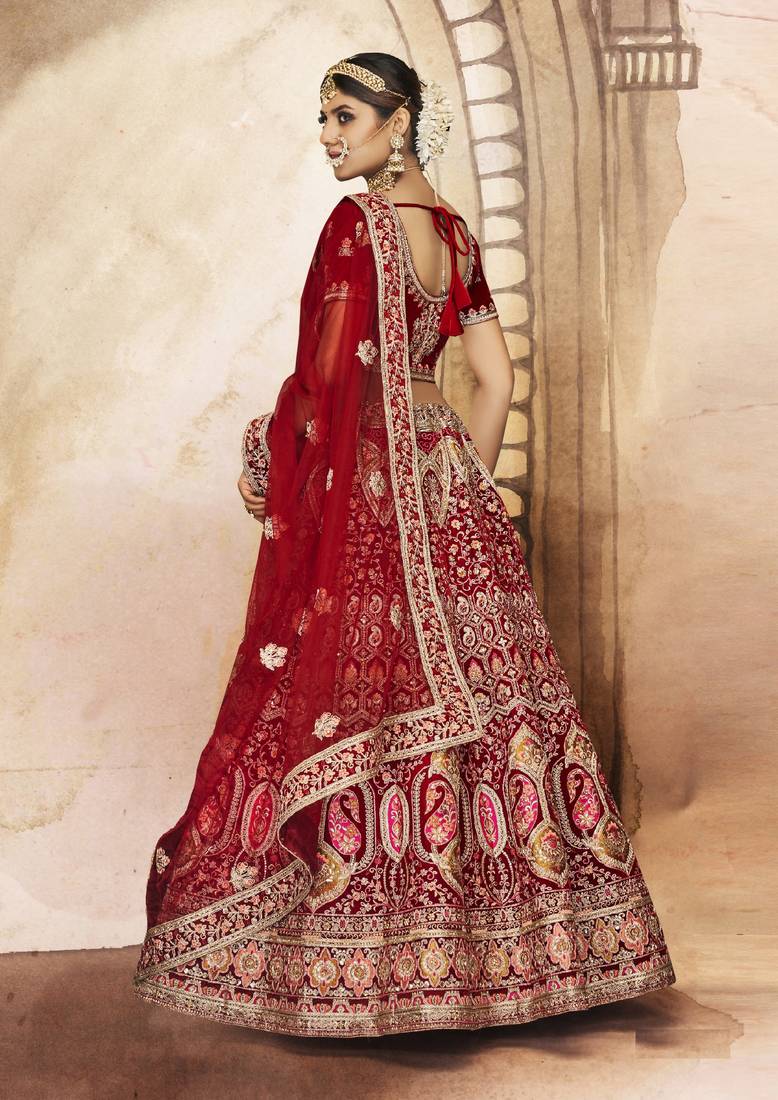 Maroon Thread, dori, zari, and sequins embroidered velvet lehenga choli for bride