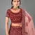 Maroon embroidered velvet semi stitched lehenga
