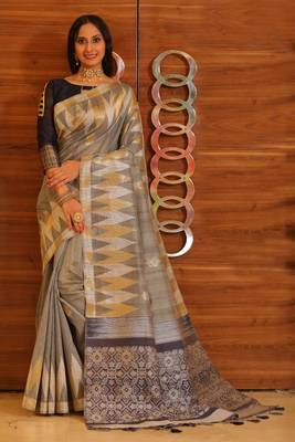 Yellow woven tissue saree with blouse 1