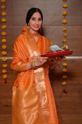 Orange woven tissue saree with blouse 1