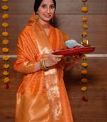 Orange woven tissue saree with blouse