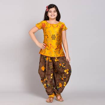 Yellow rayon printed girls stitched    Kurta  &    Dhoti 1